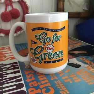 1997 M & M golfing mug